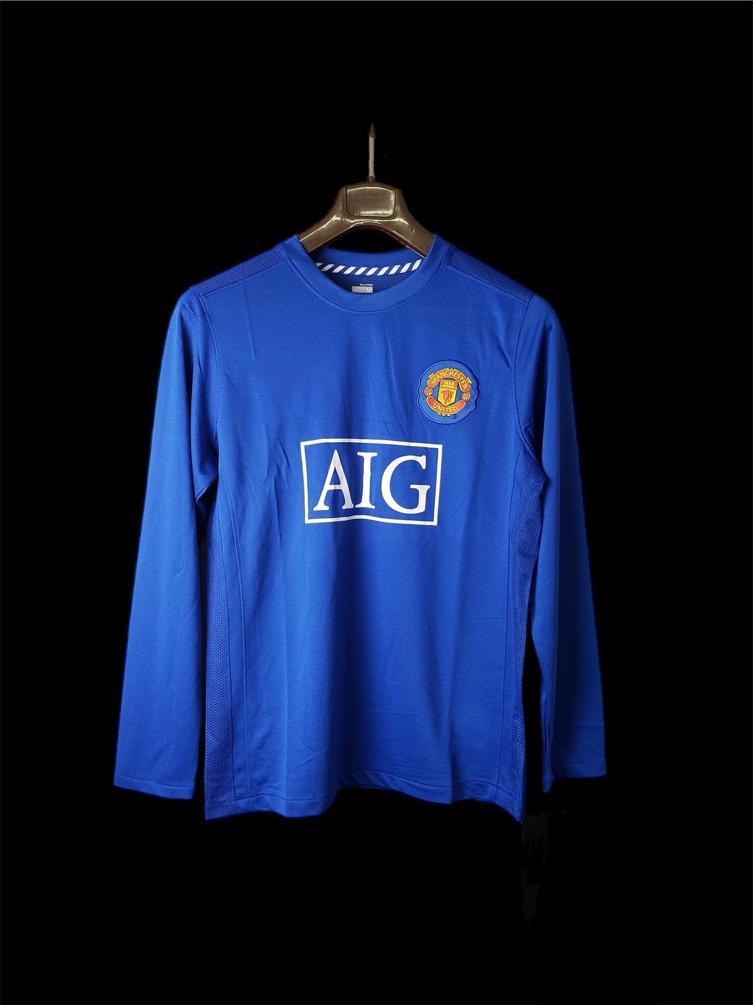 Camiseta retro de manga larga del tercer uniforme del Manchester United 2007-2008