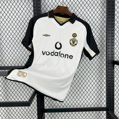Camiseta retro reversible del centenario del Manchester United 2001/02