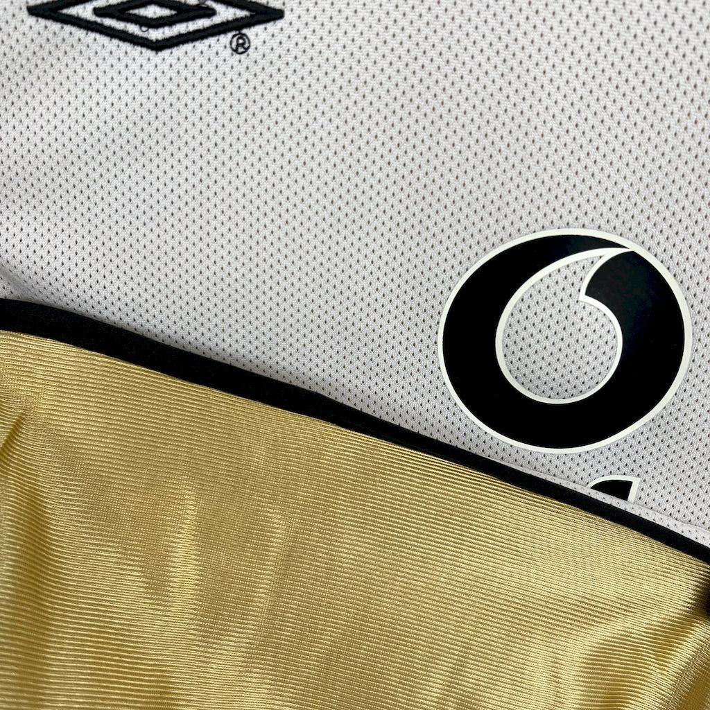 Camiseta retro reversible del centenario del Manchester United 2001/02