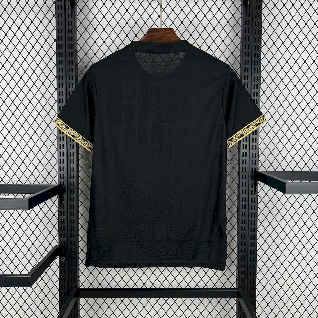 Camiseta dorada y negra de México 2025/26