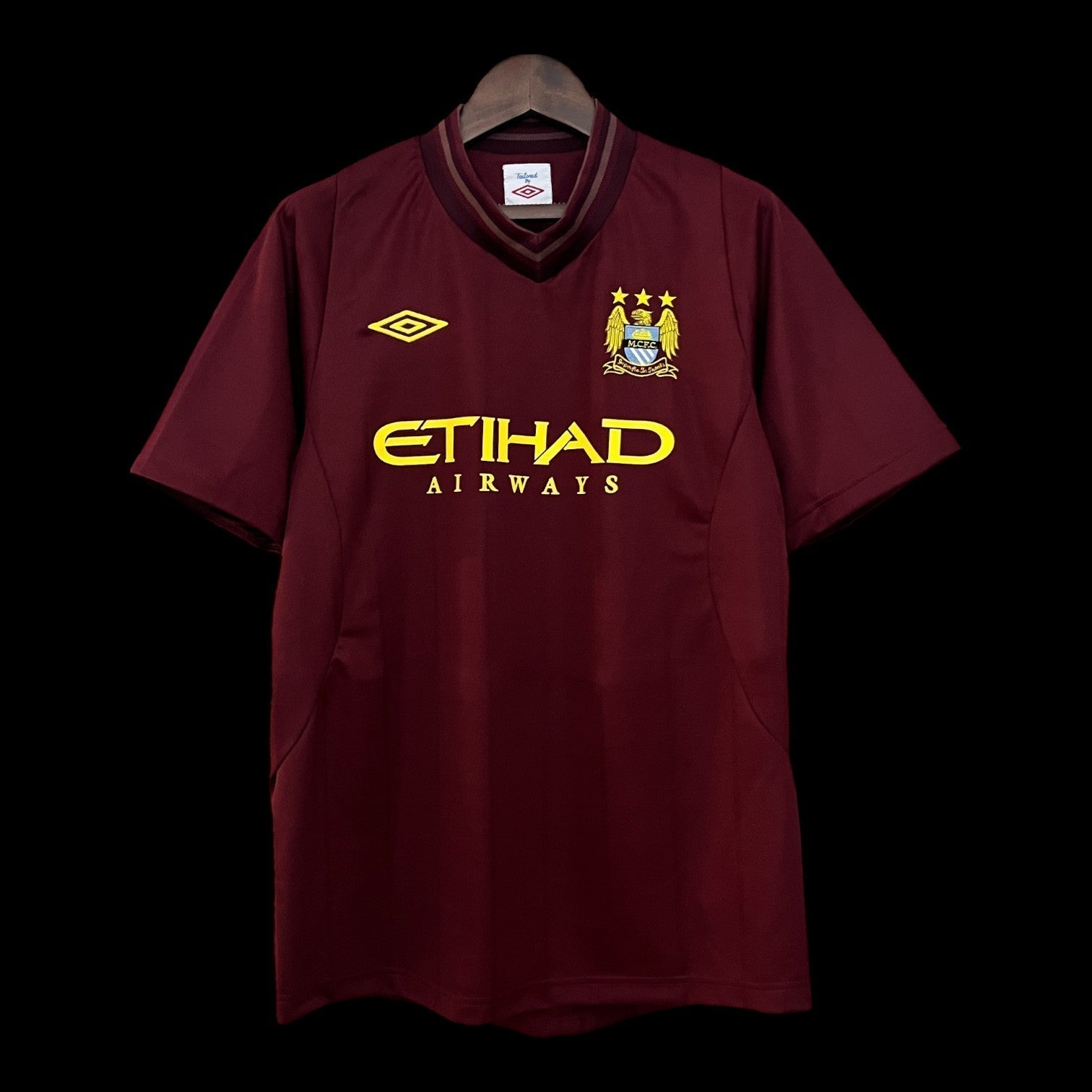 Camiseta retro del Manchester City 12/13