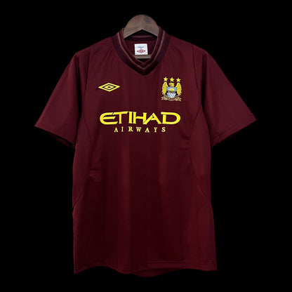 Camiseta retro del Manchester City 12/13